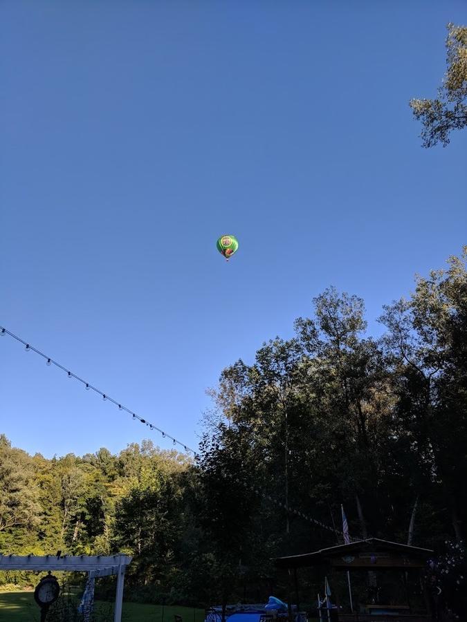 Ruth balloon in sky.jpg