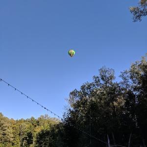 Ruth balloon in sky.jpg